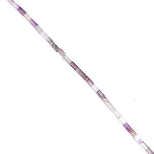 Close-up detail of natural crystal amethyst tube beads, perfect for DIY jewelry making crafts.