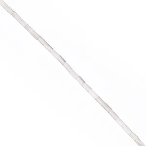 Close-up detail of natural crystal quartz tube beads, perfect for DIY jewelry making.