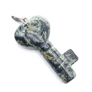 Close-up detail of the heart-shaped key stone pendant showing natural green texture.
