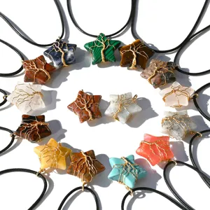 Crystal star tree of life pendant necklace natural stone wire wrapped jewelry close up details.