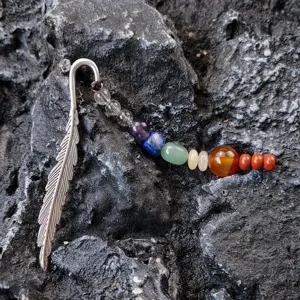 Metal feather chakra crystal bookmark detail view featuring colorful gemstone beads.