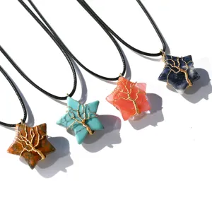Detailed view of wire-wrapped tree of life crystal star pendant necklaces in various stones.