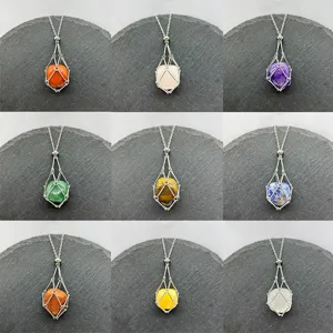 Natural crystal stone pendant necklace detail, wire mesh cage design, various gemstone options.