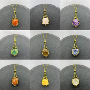 Medium stainless steel natural crystal wire-wrapped cage pendant gold necklace detail.