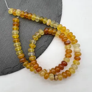 Detailed view of natural gemstone abacus spacer beads for DIY handmade jewelry crafting
