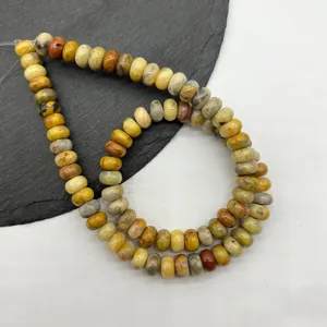 Natural semi-precious stone abacus rondelle beads detail shot for jewelry making diy.