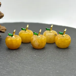 Natural yellow crystal stone apple pendants with gold stems and green leaves for DIY jewelry.