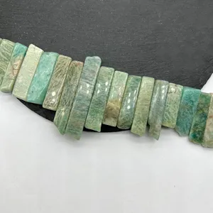 Detail shot of natural amazonite flat tube beads, irregular square bar stones for DIY jewelry making.