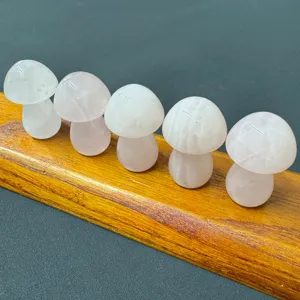 Close-up of five natural rose quartz crystal mushroom carvings, perfect for DIY micro landscapes.