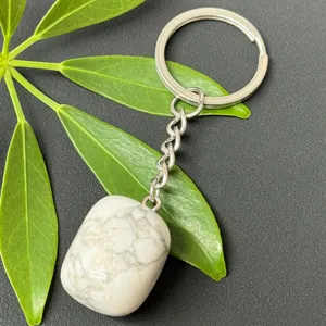 Natural white stone keychain with stainless steel ring and tumbled gemstone charm pendant.