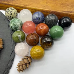 Close-up detail of natural gemstone crystal spheres, polished mineral stone balls for home decor.
