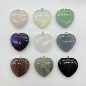 Detailed view of 30mm heart shaped crystal stone pendant charms with bail for DIY jewelry making.
