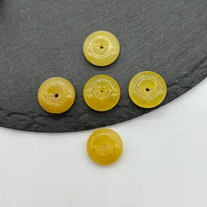 Perles de jade en cristal jaune naturel pour fabrication de bijoux DIY, vue détaillée.