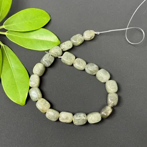 Detailed close-up view of irregular square gemstone loose beads, showing natural texture and finish.