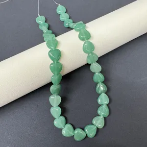Detailed view of 12mm natural green stone heart-shaped loose beads strand for DIY jewelry making.