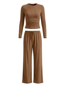 Casual long sleeve crop top and wide leg pants set in solid brown, cozy autumn outfit.