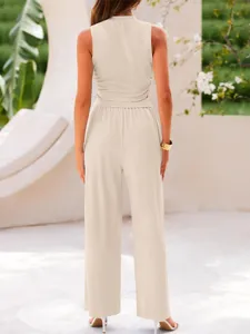 Detail shot of a solid ribbed two-piece set, featuring a crop top and high-waist wide-leg pants.