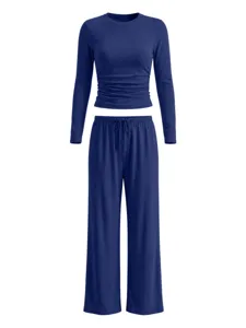 Solid color casual long-sleeve top and wide-leg pants set detail view, comfortable lounge wear.