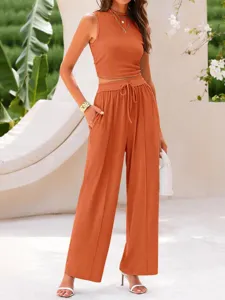 Detailed view of the solid ribbed two-piece crop top and high waist wide leg pants set.