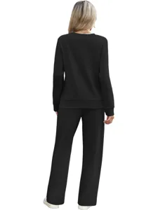Detailed view of women's casual black long sleeve sweatshirt and pants set from behind.