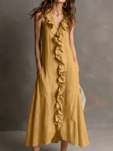 Close-up detail of the sleeveless ruffle maxi dress featuring a V-neck and pockets.