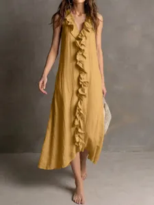 Detail view of the sleeveless linen V-neck dress showcasing elegant center ruffle details.