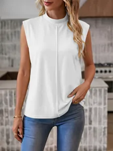 Solid white mock neck sleeveless top detailed view, showcasing the elegant center seam design.