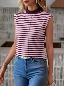 Close-up detail shot of the stylish striped mock neck sleeveless top showing texture and fit.