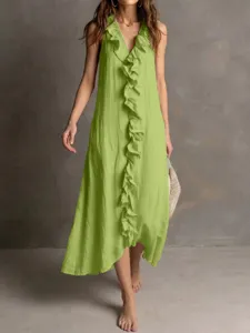 Detailed view of the sleeveless green V-neck dress featuring elegant front ruffles and hem.