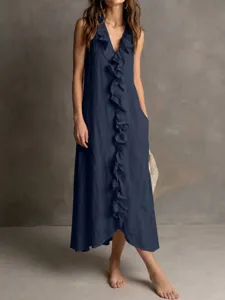 Detailed view of the sleeveless v-neck ruffle long dress, highlighting fabric texture and design.