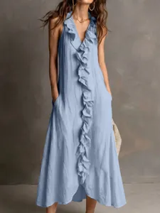 Detail view of a light blue sleeveless maxi dress featuring vertical ruffles and pockets.