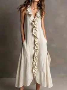 Detail view of the sleeveless V-neck maxi dress featuring center ruffle and elegant flow.
