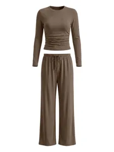 Detailed view of the casual solid long sleeve crop top and wide leg pants loungewear set.