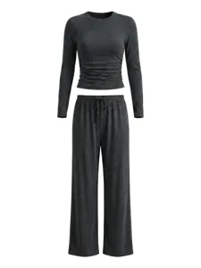 Dark grey casual long sleeve crop top and matching wide leg pants lounge set for women.