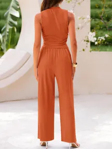 Solid color two piece vest and wide leg pants set, casual women's summer outfit detail.