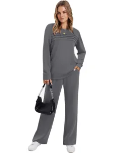 Detailed view of the casual grey long sleeve sweatshirt and wide leg pants set for women.