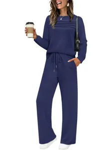 Detailed view of women's casual long sleeve sweatshirt and pants set in solid dark blue color.