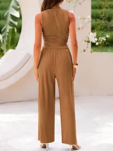 Detailed back view of solid ribbed knit two piece crop top and high waist wide leg pants.