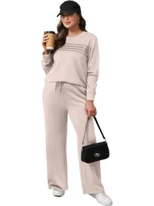 Casual two-piece loungewear set featuring a long sleeve top and matching wide leg pants.
