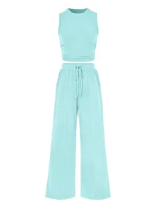 Light blue ribbed two-piece set detail, featuring a cropped tank top and wide-leg pants.