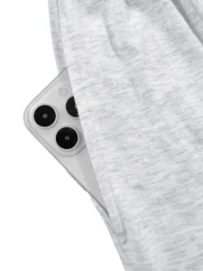 Light gray casual knit sweatpants pocket detail minimalist style everyday comfort wear.