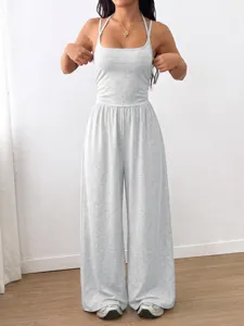 Casual summer halter wide-leg jumpsuit for women, sleeveless backless loose streetwear.