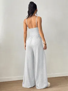 Back view detail of casual light grey spaghetti strap wide-leg jumpsuit, soft fabric.