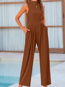 Sleeveless solid color wide-leg jumpsuit with pockets, casual elegant summer fashion detail view.