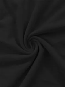 Close-up detail of smooth black fabric with elegant spiral texture and soft matte finish.