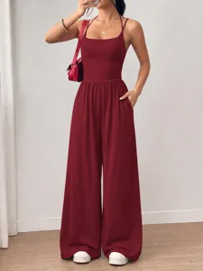 Wine red strapless halter jumpsuit with wide leg design, casual summer fashion style.