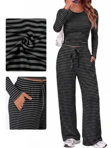 Women's striped long sleeve top and wide leg pants casual two piece lounge set with pockets.