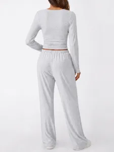 Grey long sleeve top and wide leg pants set detail view, casual two-piece loungewear style.
