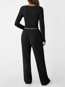 Women's casual black long sleeve top and loose trousers two-piece set, ideal for daily wear.