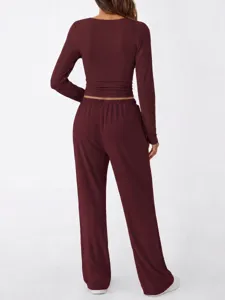 Casual solid color long sleeve top and wide leg pants two-piece loungewear set.